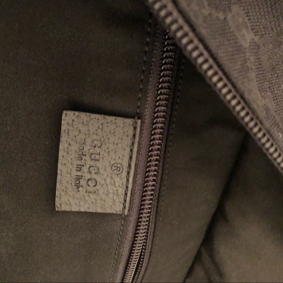 Gucci GG monogram duffle bag with signature straps